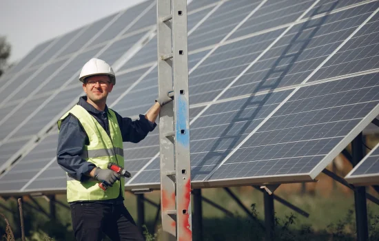 man-with-white-helmet-near-solar-panel (1)